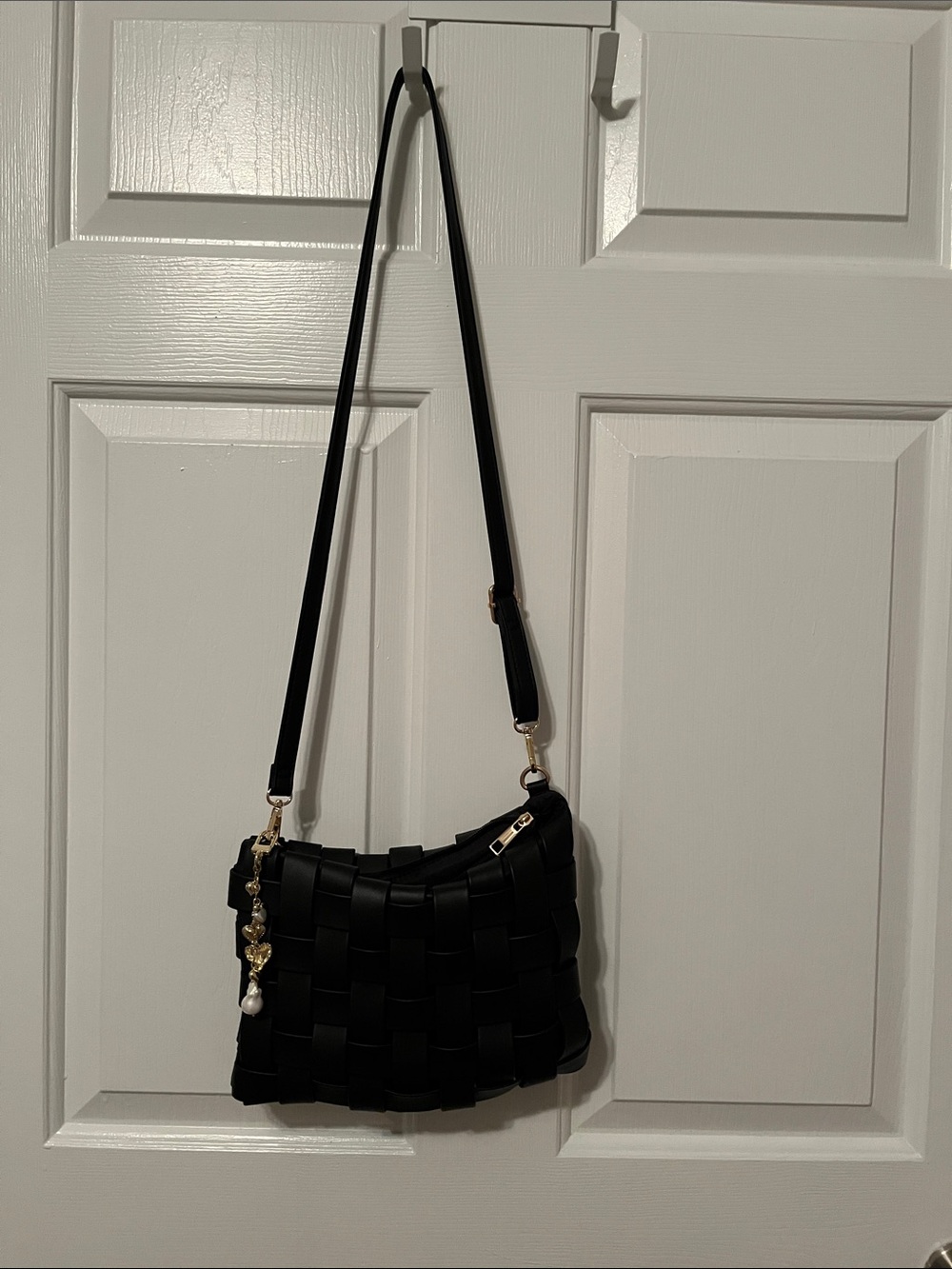 Anthropologie Black Lindy bag with bag charm